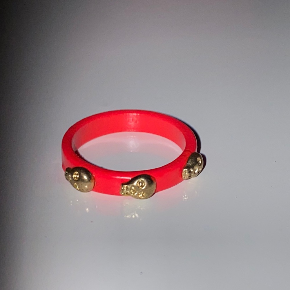 Pink Ring with Gold Skulls